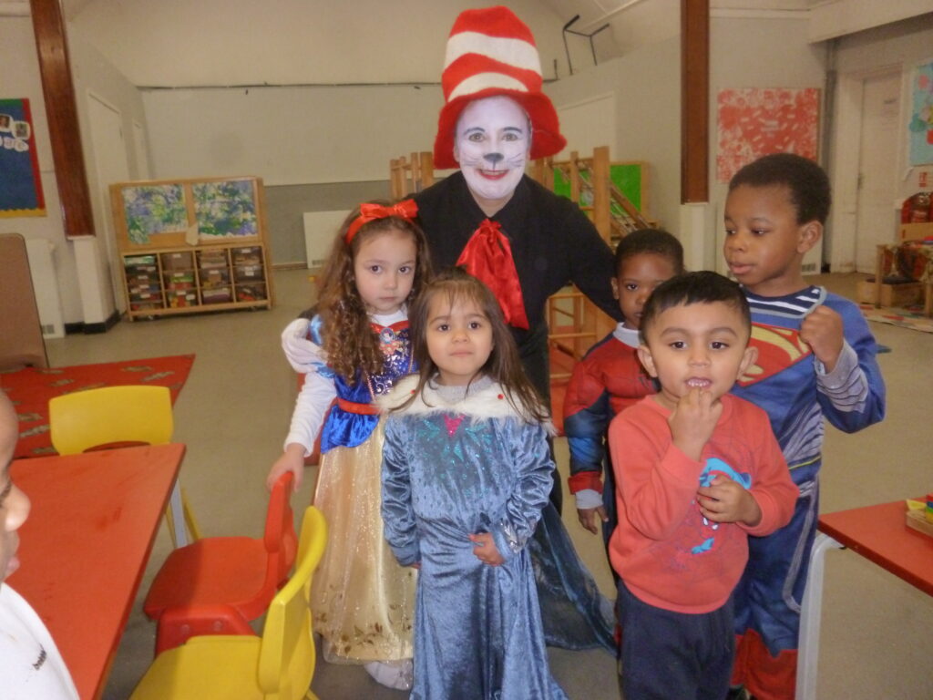 kids and pre school manager dressed up for World Book Day